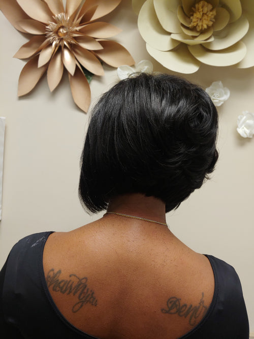 Natural hair silk press  with extensions added and bob hair cut. Hair cuts and color on black women near me. For the best in healthy hair care with treatments to support your hair goals